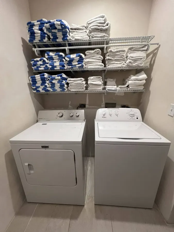 Walk-in laundry with full-size washer and dryer